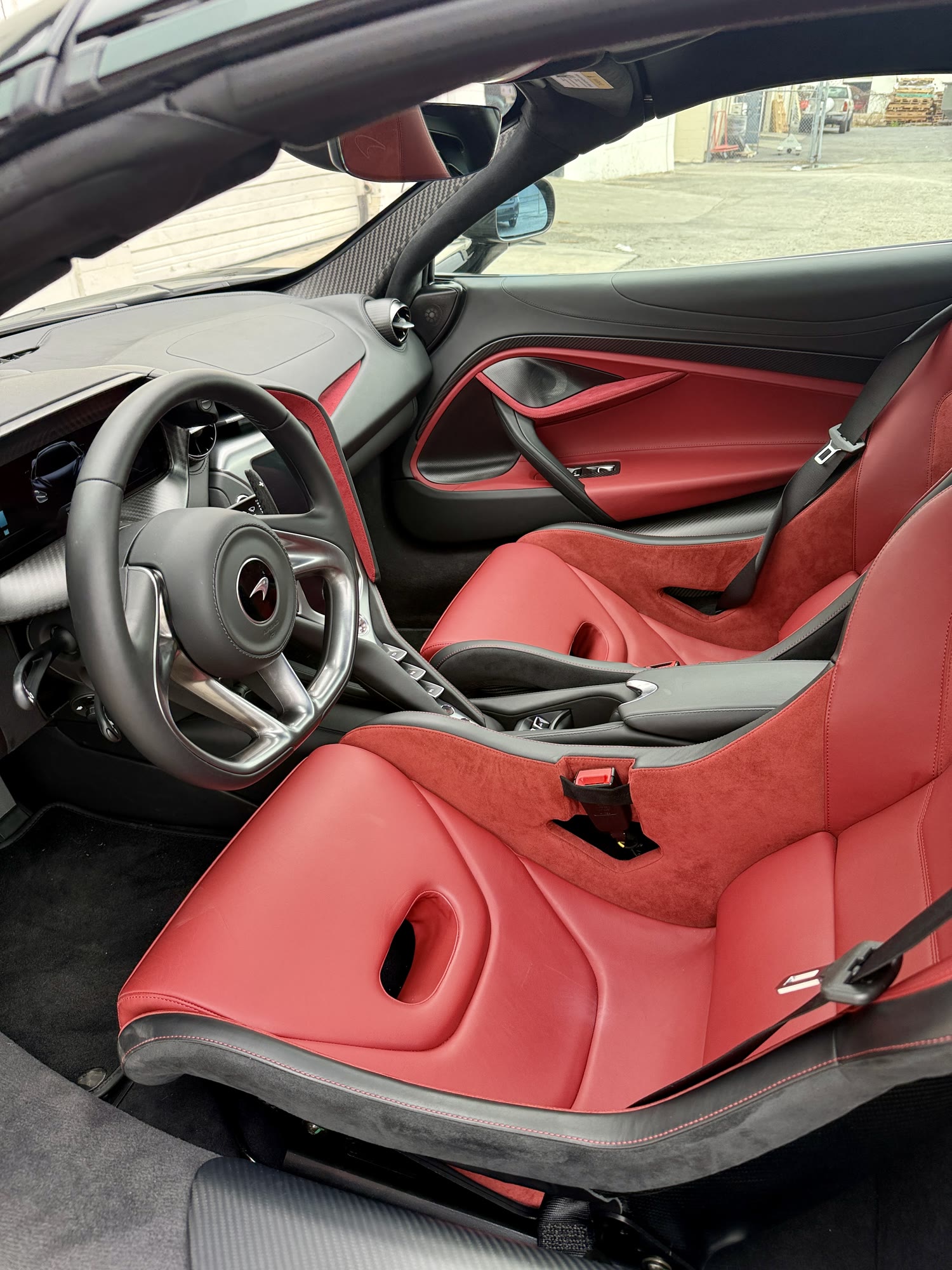 McLaren red leather and Alcantara interior after detailing